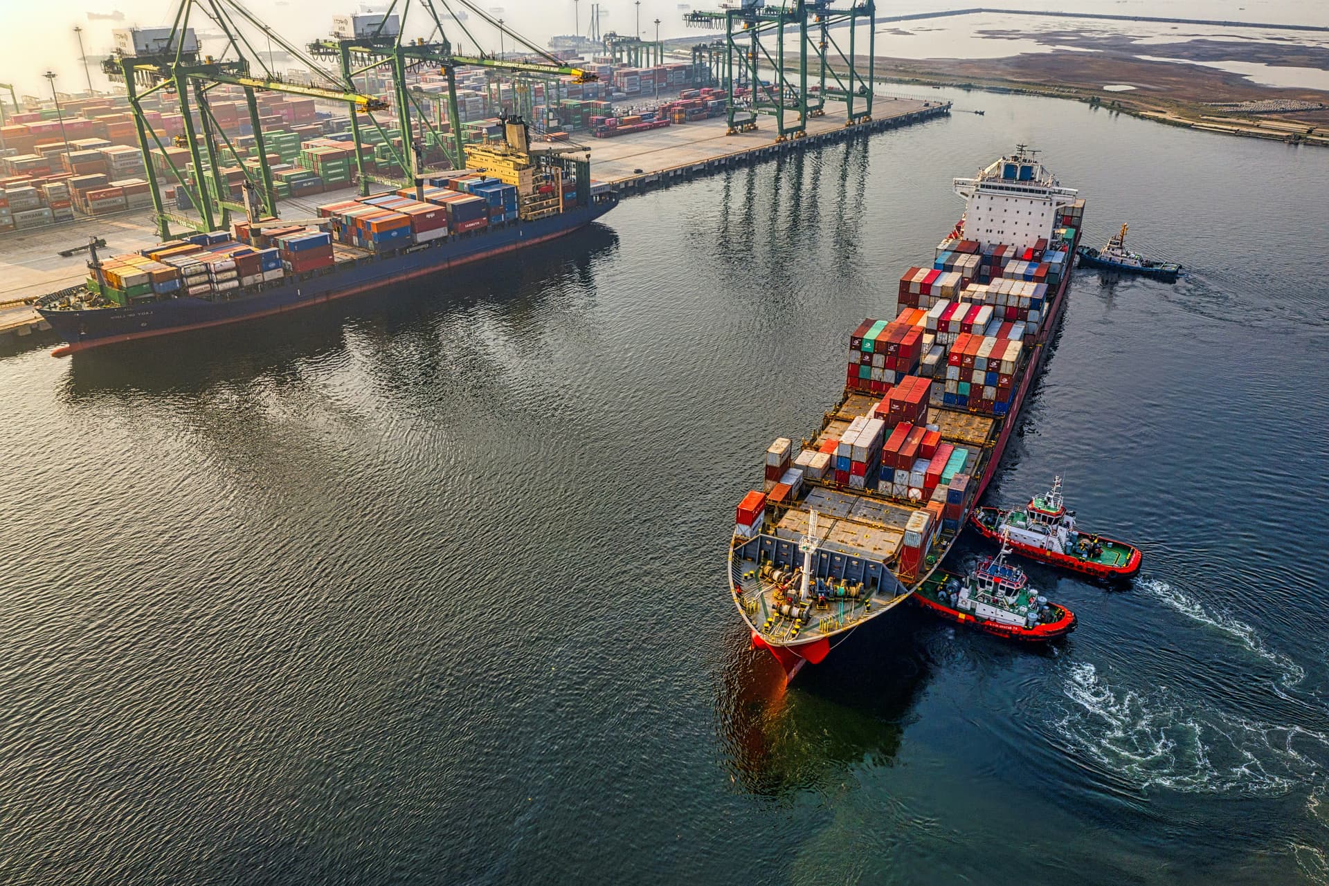 Containers being loaded for export at a shipping port
